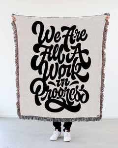 "We Are All a Work in Progress" Woven Art Blanket by Mark Caneso