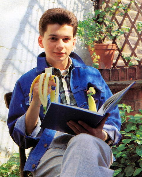 Young Dave Gahan eating a banana